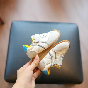 Breathable baby toddler sneakers featuring classic silver stripes and hook-and-loop straps