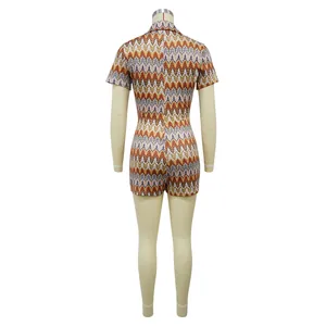 Back view of women's short sleeve romper with colorful zigzag wave print pattern.