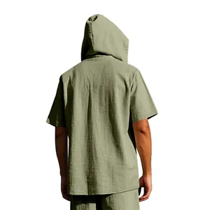 Detailed back view of a men's loose casual sage green linen hooded short sleeve shirt