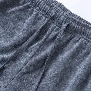 Close-up of elastic waistband with drawstring on grey men's terry casual shorts