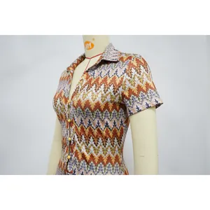 Detailed view of colorful wave pattern fabric on a V-neck short sleeve fashion romper