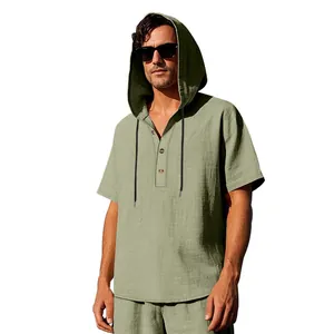 Side view of a men's loose fit sage green short sleeve linen hooded Henley shirt for summer.
