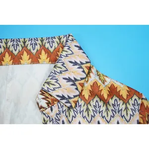 Detailed macro view of the wave pattern collar on a colorful fashion romper jumpsuit