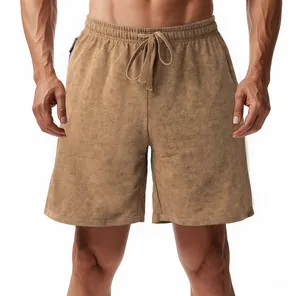 Front view of men's khaki tie-dye shorts featuring an elastic drawstring waist and soft texture