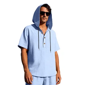 Close-up of light blue linen hooded Henley shirt with short sleeves on a male model