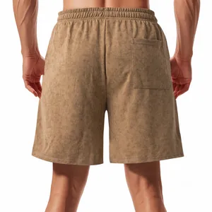 Back view of men's loose tie-dye French Terry shorts with elastic waist and pocket