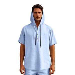 Detail shot of a men's light blue hooded linen Henley shirt for summer beach wear