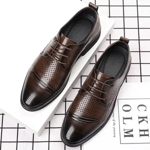 Elegant brown leather derby shoes for men featuring stylish brogue perforation details
