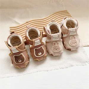 Detail view of morino rinkle baby sandals with cute bear and rabbit embroidery