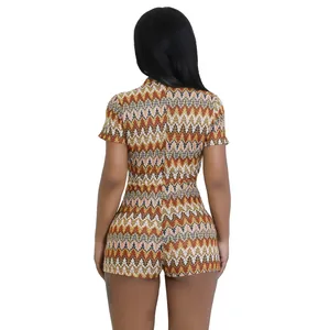 Detail back view of a colorful wave pattern short sleeve romper jumpsuit for women