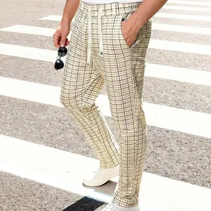 Middengedeelte van een herenpantalon met ruitjes, trekkoord en zakken
