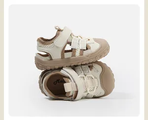 Detailed view of baby walking sandals featuring anti-collision toe and velcro strap