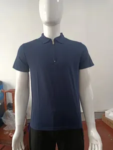 Professional front view of men's navy blue short-sleeve polo shirt with half-zip design