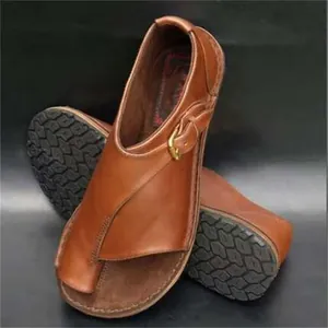 Women's casual brown leather flat sandals featuring buckle and toe-loop design