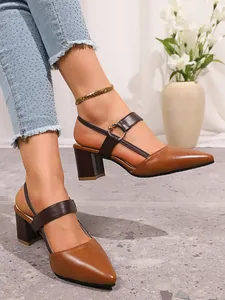 Elegant pointed toe block heel pumps in caramel brown with stylish dual strap detail
