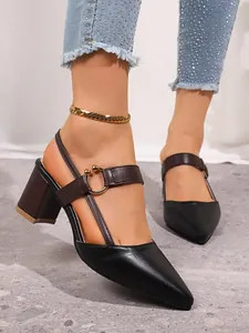 Pointed-toe block heel pumps in black and brown with stylish metal ring strap