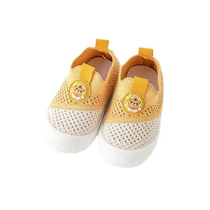 Breathable fly-woven baby toddler shoes with soft non-slip soles and cartoon bear detail