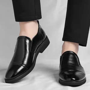 Elegant black men's slip-on business leather shoes with a polished professional finish
