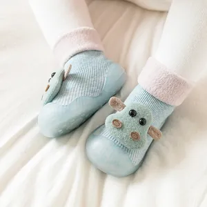 Soft knit winter baby walking shoes with cute hippo character and non-slip blue rubber sole