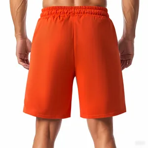 Vue arrière détaillée du short de golf côtelé orange vif pour hommes avec taille élastique