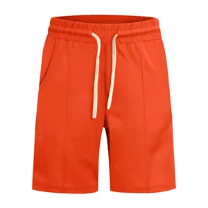 Short de golf orange vif pour homme avec détails de plis et cordon de serrage à la taille