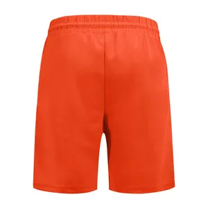 Vue arrière du short de golf orange pour homme avec texture côtelée et taille élastique