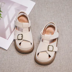 Elegant cream closed-toe sandals for girls with soft sole and stylish buckle detail