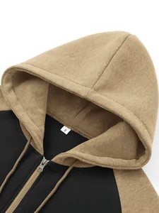 Close-up detail of color-block raglan hoodie showing hood texture and size S tag label