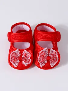 Chaussures de princesse pour bébé rouges à semelle souple avec nœuds en dentelle