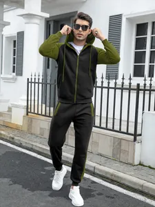 Men's olive and black color-block tracksuit set featuring raglan sleeve hoodie