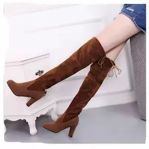 Women's brown suede over-the-knee high heel boots featuring a stylish rear lace-up design