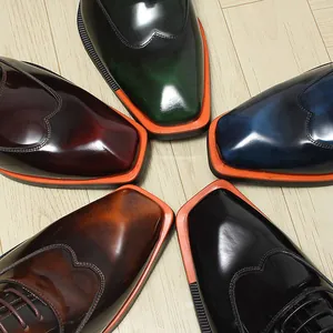Detailed view of glossy leather men's business shoes in five vibrant colors