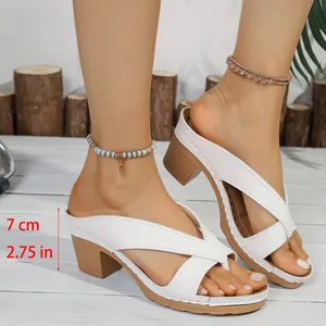 Detailed side view of fashionable white chunky heel thong sandals with 7cm/2.75in heel