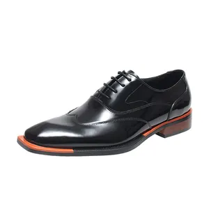 Classic black shiny leather men's oxford dress shoes with stylish orange welt detail