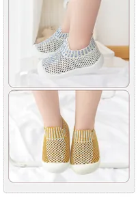 Detail view of breathable mesh baby walking shoes with soft rubber soles in blue and yellow colors