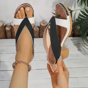 Detailed view of black and white chunky heel thong sandals for women summer fashion