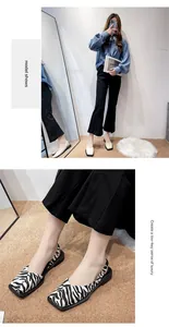 Close-up of zebra pattern square toe slingback shoes for women in a casual setting