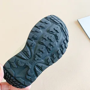 Detailed view of the durable non-slip rubber sole on kids' summer closed-toe sandals.