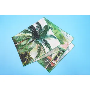 Detailed close-up showing the tropical palm tree print on lightweight beach sarong wrap