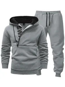Detailed view of gray men's hooded tracksuit set featuring a unique side zipper design