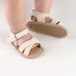 Detail of beige baby summer sandals with soft non-slip pre-walker soles