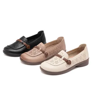 Vintage ethnic style hollow out leather flat shoes for women shown in three colors