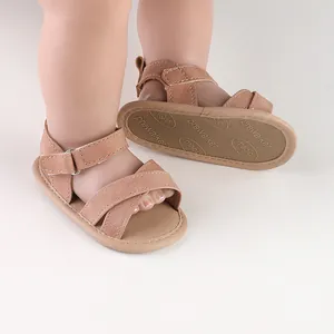 Soft brown suede baby summer sandals for pre-walking infants with non-slip patterned soles