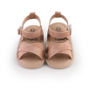 Detailed view of pink crossover strap baby summer sandals for walking
