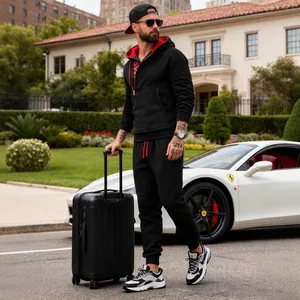 Men's casual black hooded tracksuit set with fleece lining and side zipper detail.