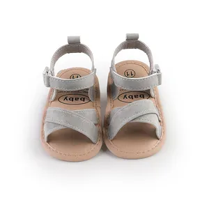 Top view detail of grey infant walking sandals for babies aged 0 to 1 year old