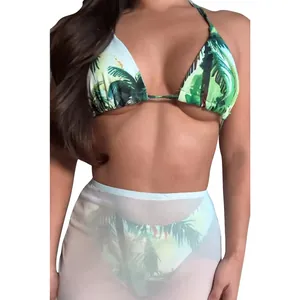 Tropical palm print bikini set with matching sheer white mesh beach skirt cover-up