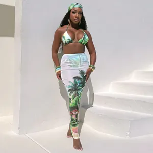 Detail view of tropical palm print bikini set with matching long skirt and headscarf