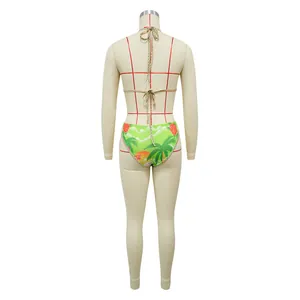 Detailed back view of a tropical palm tree print bikini on a professional tailoring mannequin.