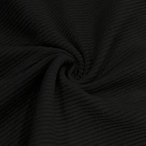 Macro di tessuto di velluto a coste nero che mostra la trama a coste premium